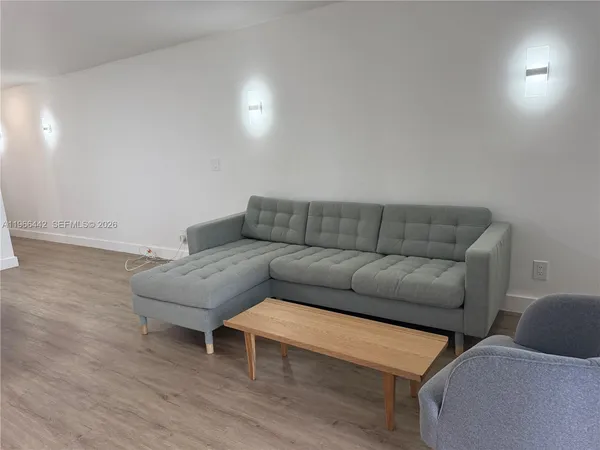 a living room with furniture and a couch