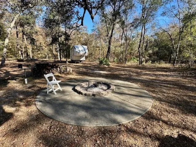 a view of a water fountain in middle of the road