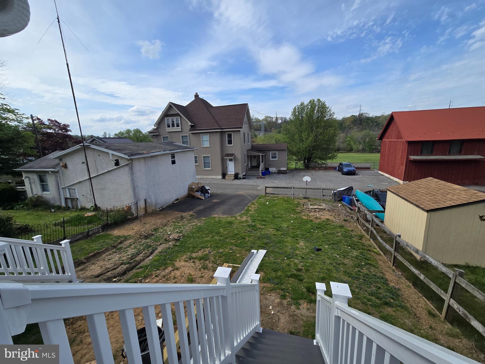 2540 Mount Road, Unit A Aston, PA 19014 - Photo 12 of 14 a view of a house with a small yard and deck