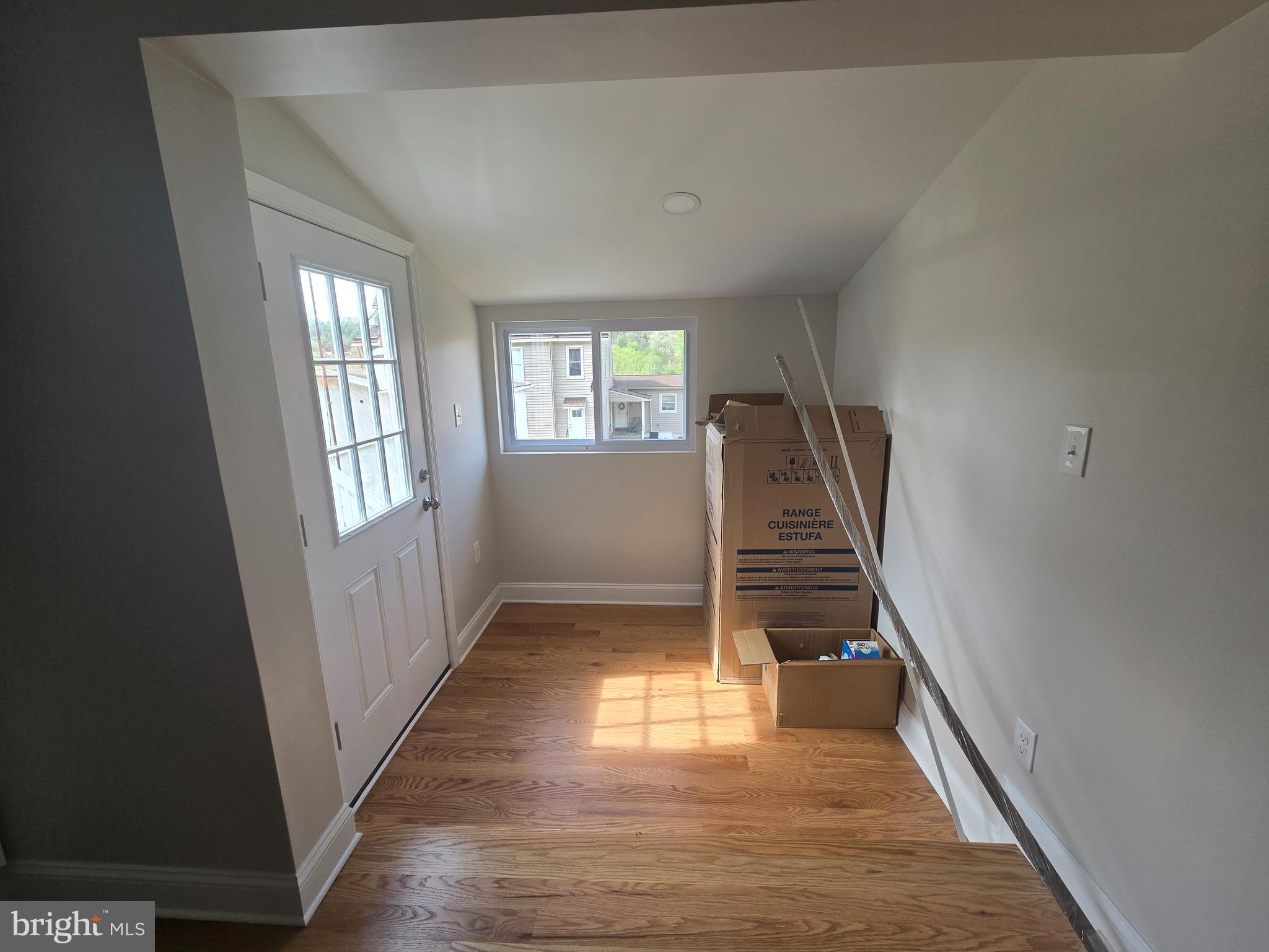 2540 Mount Road, Unit A Aston, PA 19014 - Photo 6 of 14 a view of entryway and hall with wooden floor