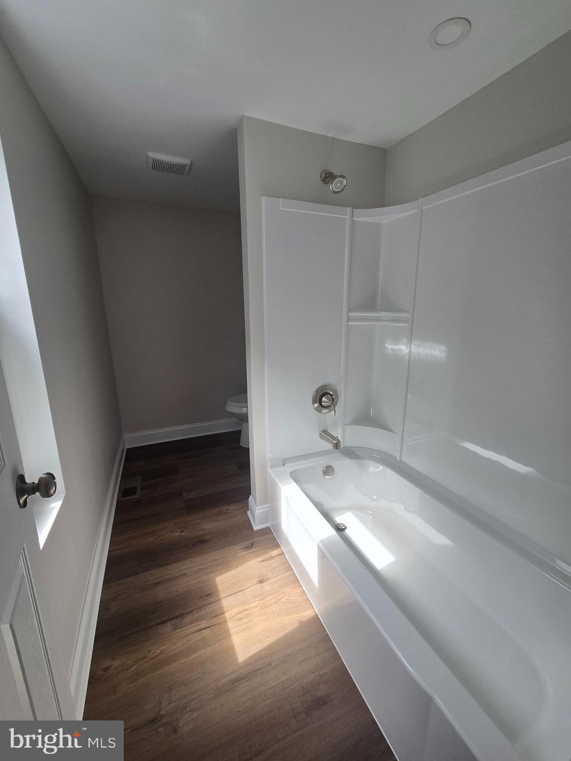 2540 Mount Road, Unit A Aston, PA 19014 - Photo 9 of 14 a bathroom with a tub sink and vanity