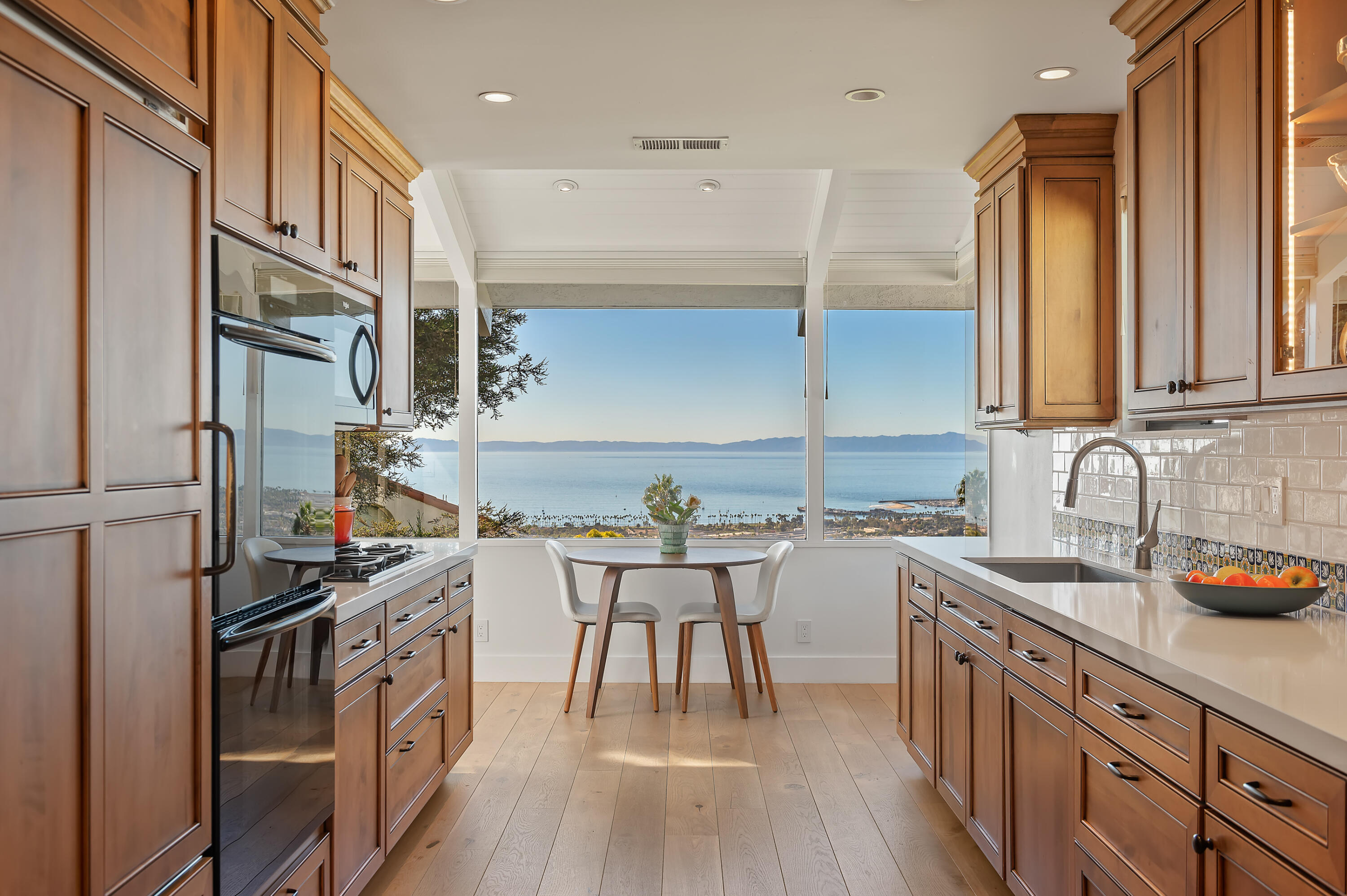 10 Rincon Vista Road Santa Barbara, CA 93103 - Photo 16 of 40 a kitchen with stainless steel appliances granite countertop a sink stove and refrigerator