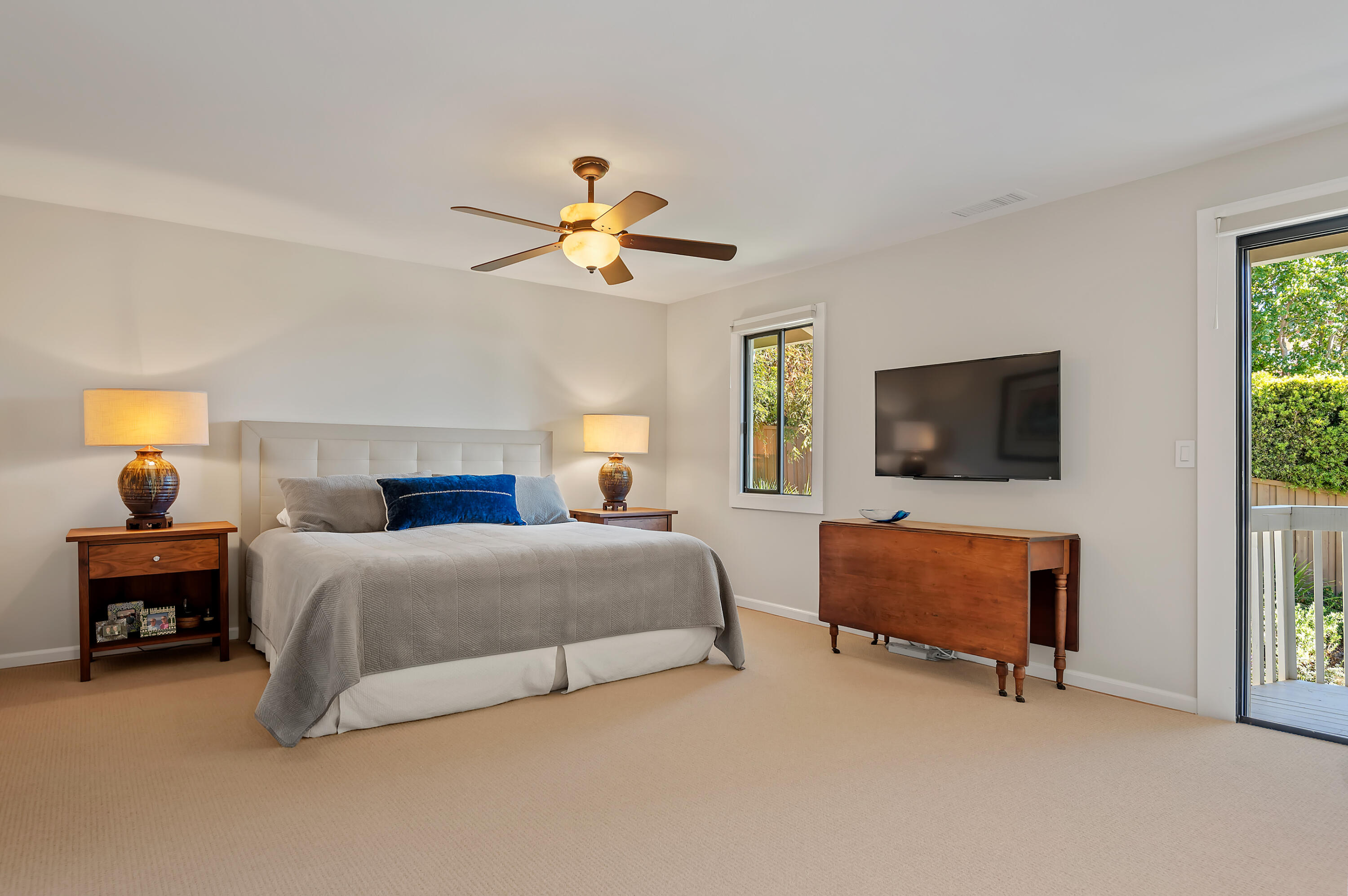 10 Rincon Vista Road Santa Barbara, CA 93103 - Photo 20 of 40 a bedroom with a bed a couch and a window