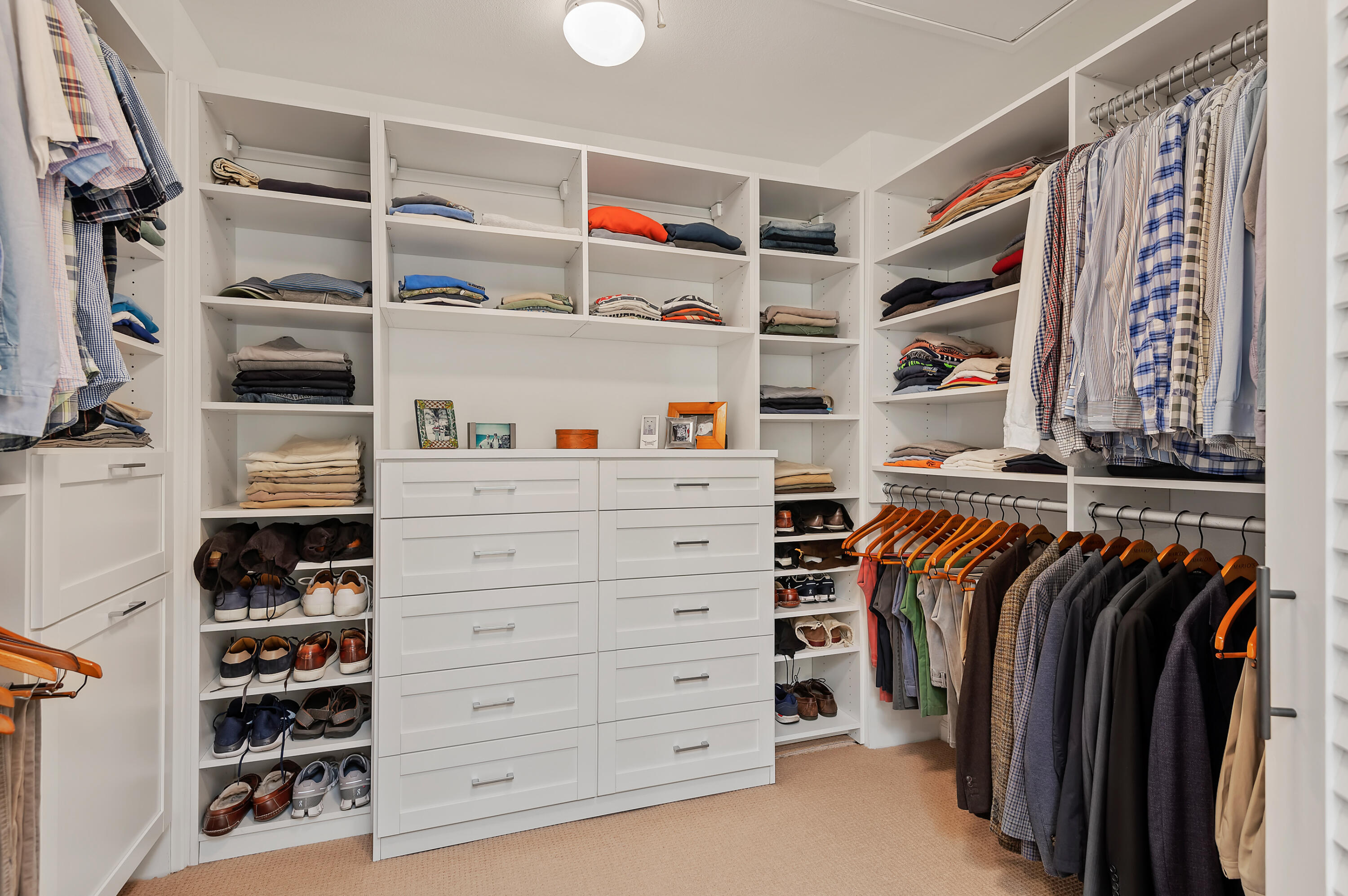 10 Rincon Vista Road Santa Barbara, CA 93103 - Photo 23 of 40 a view of walk in closet with clothes and shoes