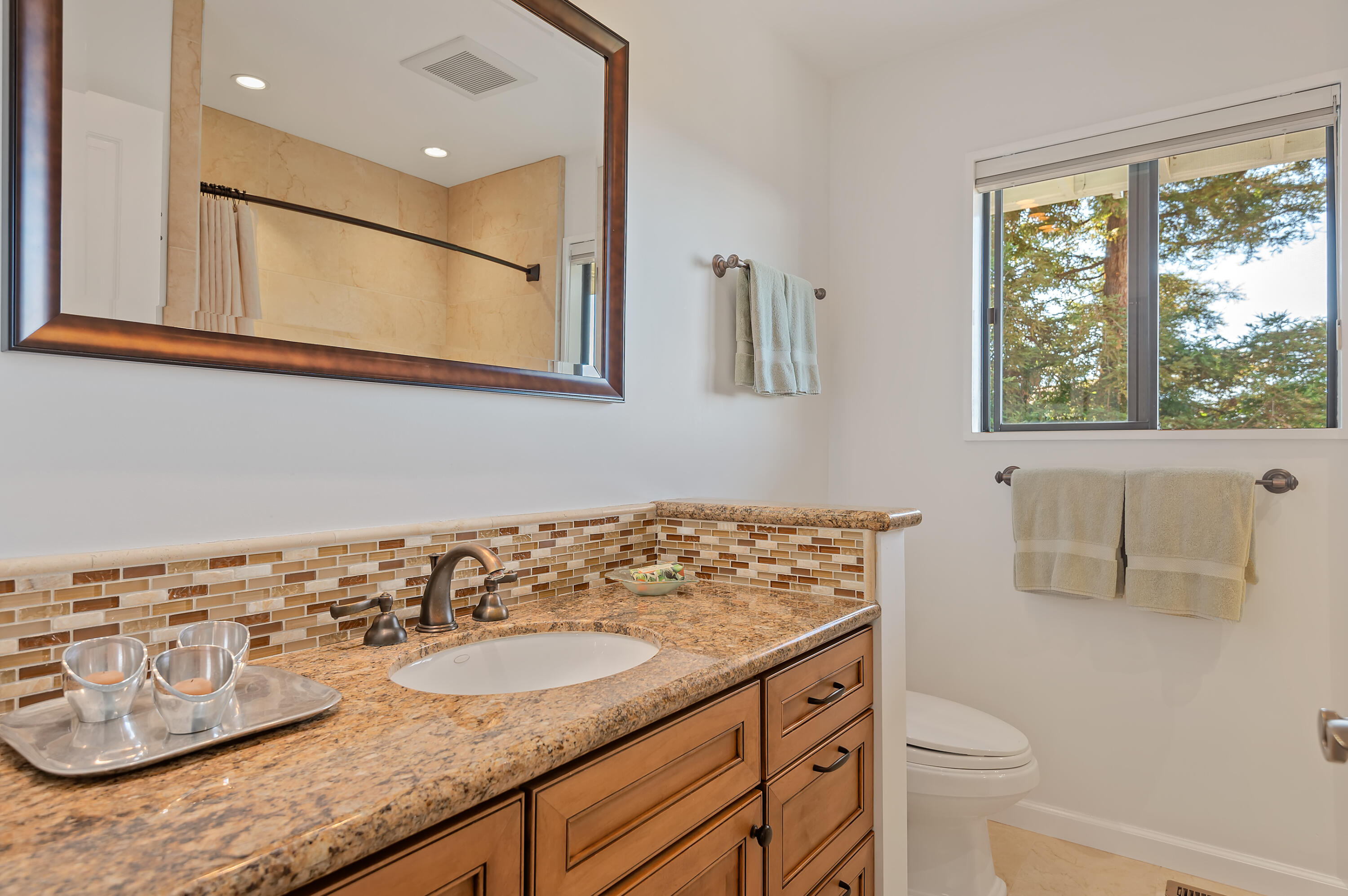 10 Rincon Vista Road Santa Barbara, CA 93103 - Photo 30 of 40 a bathroom with a sink and a mirror