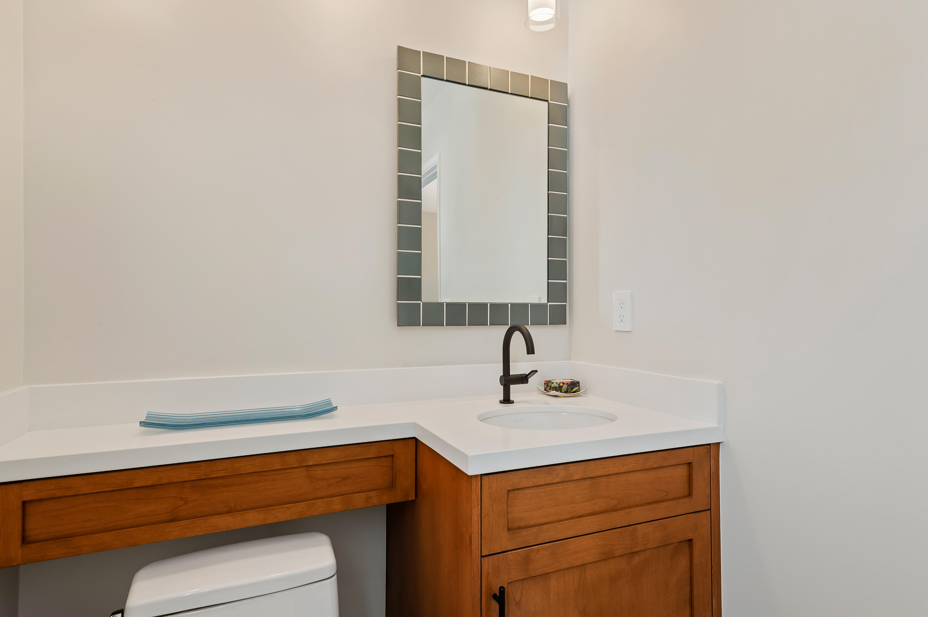 10 Rincon Vista Road Santa Barbara, CA 93103 - Photo 32 of 40 a bathroom with a sink and a mirror