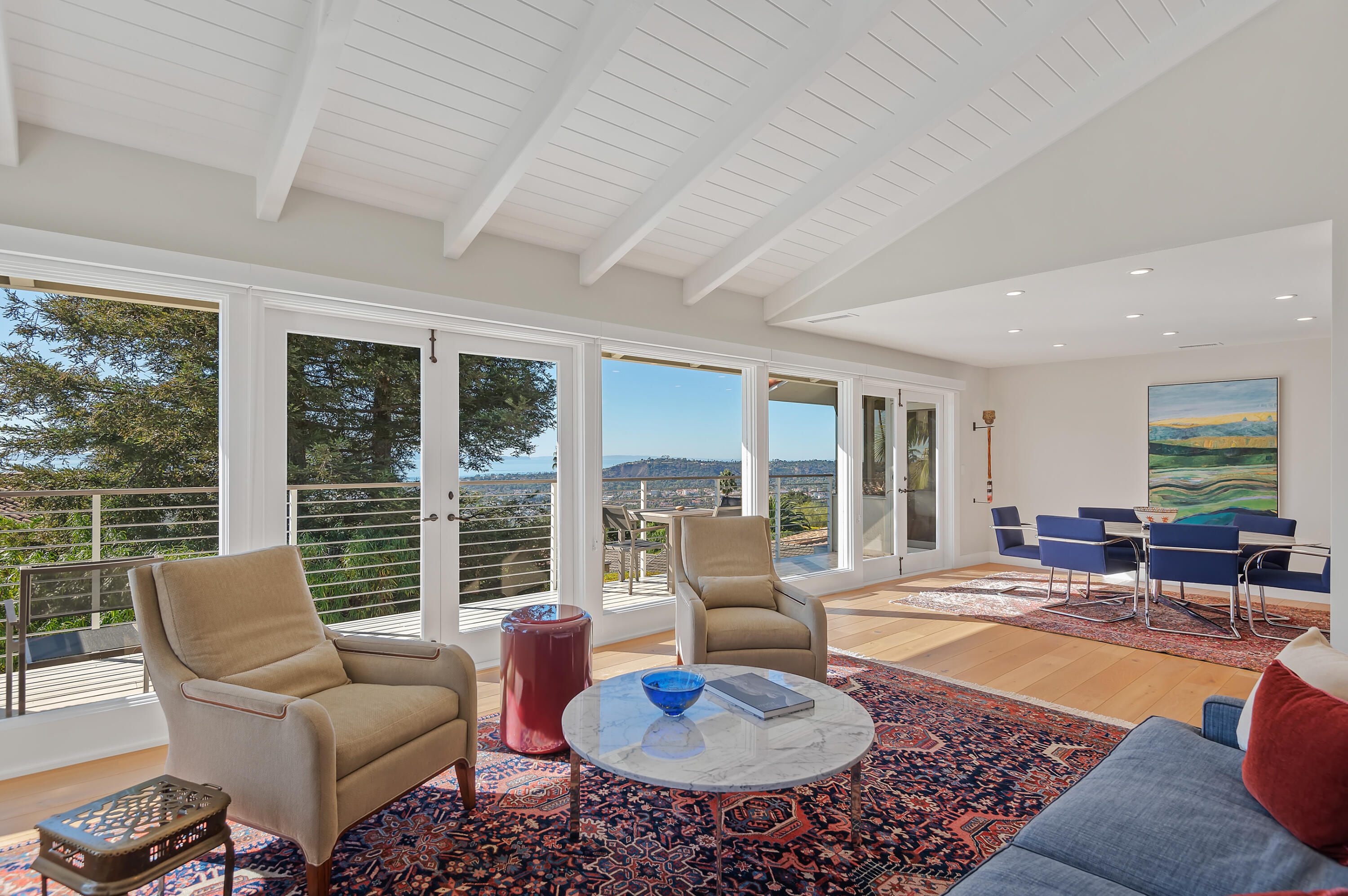 10 Rincon Vista Road Santa Barbara, CA 93103 - Photo 5 of 40 a living room with furniture a large window and a table