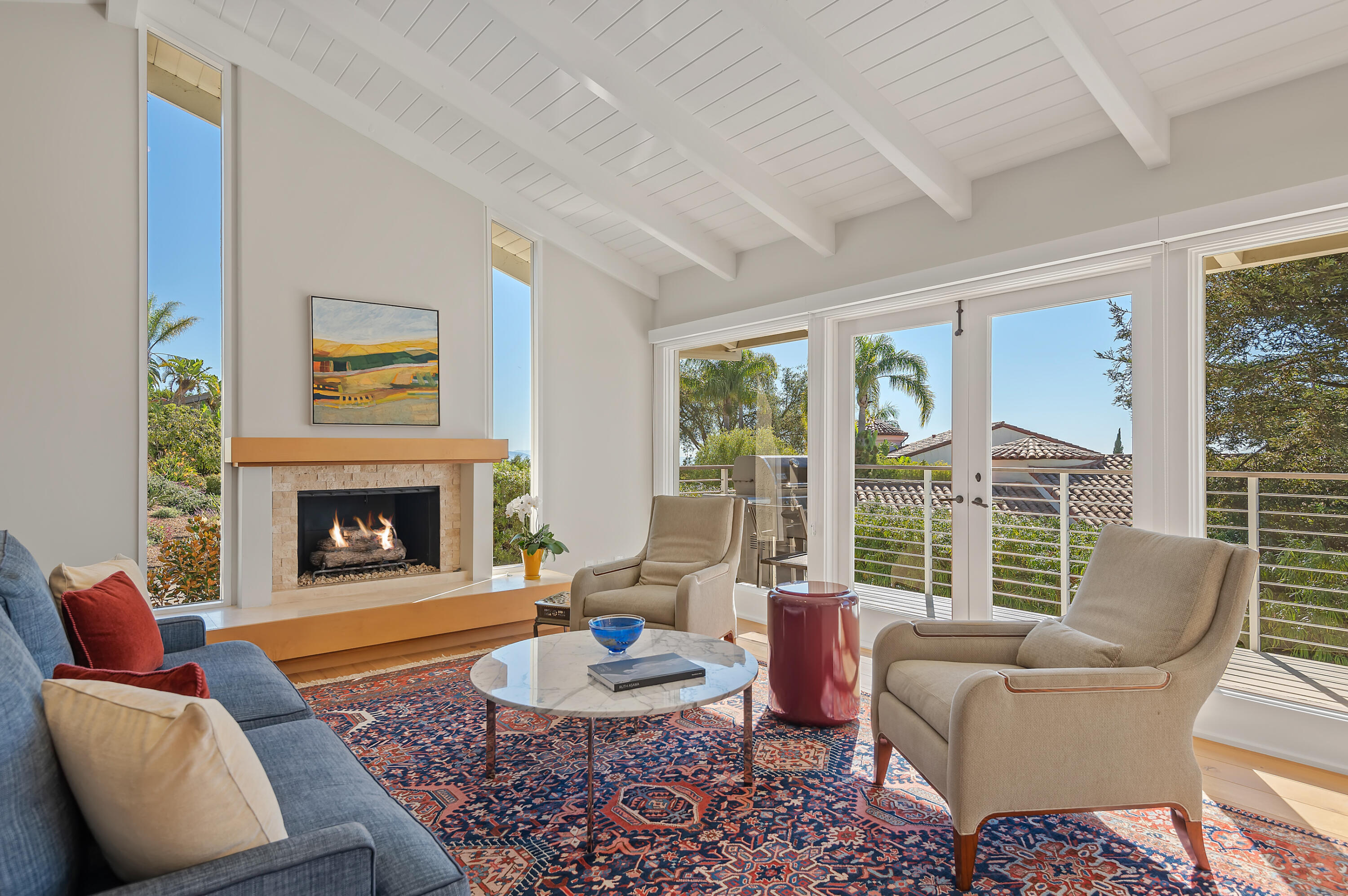 10 Rincon Vista Road Santa Barbara, CA 93103 - Photo 6 of 40 a living room with furniture and a fireplace