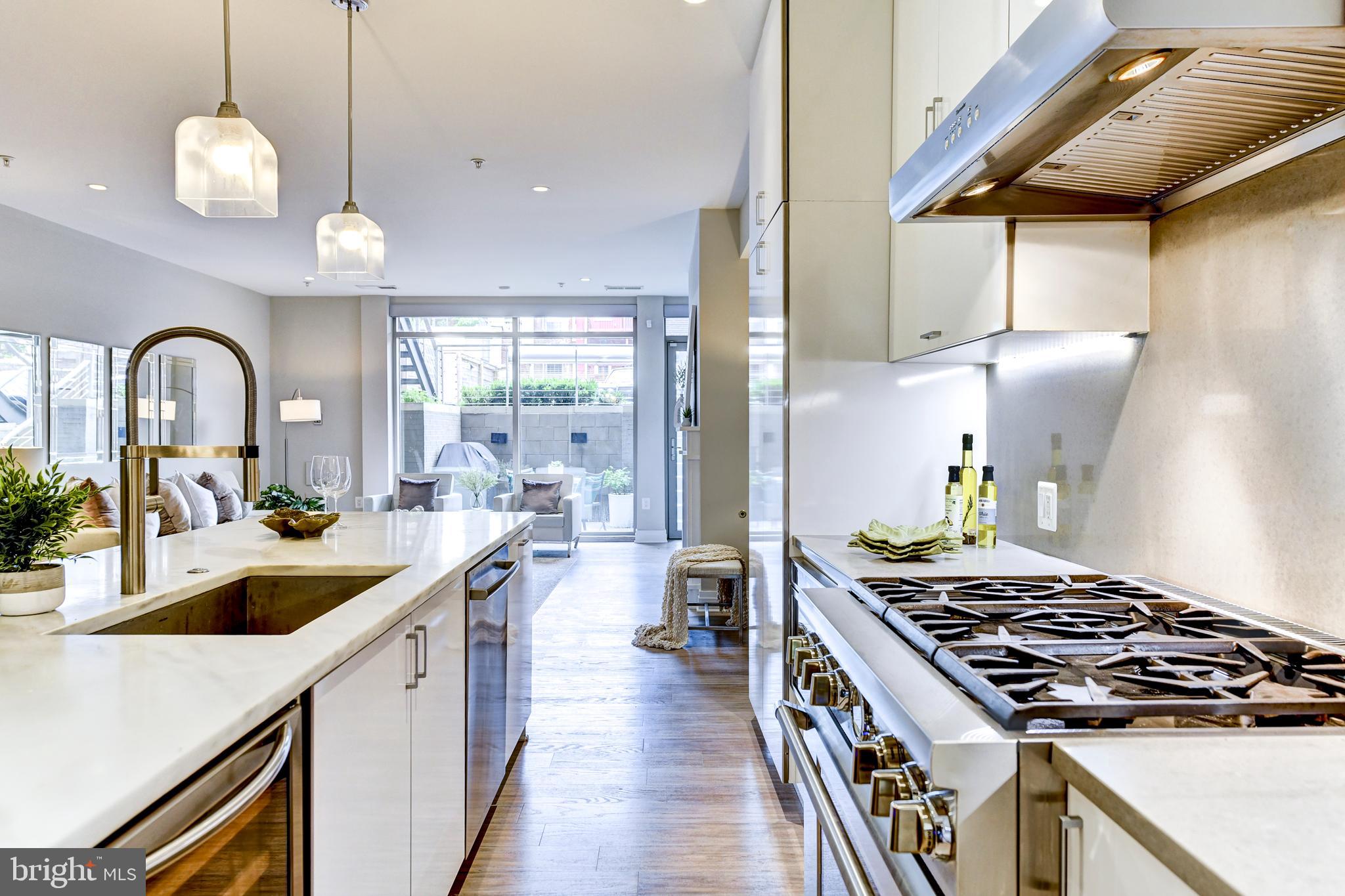 Open kitchen, dining, living space