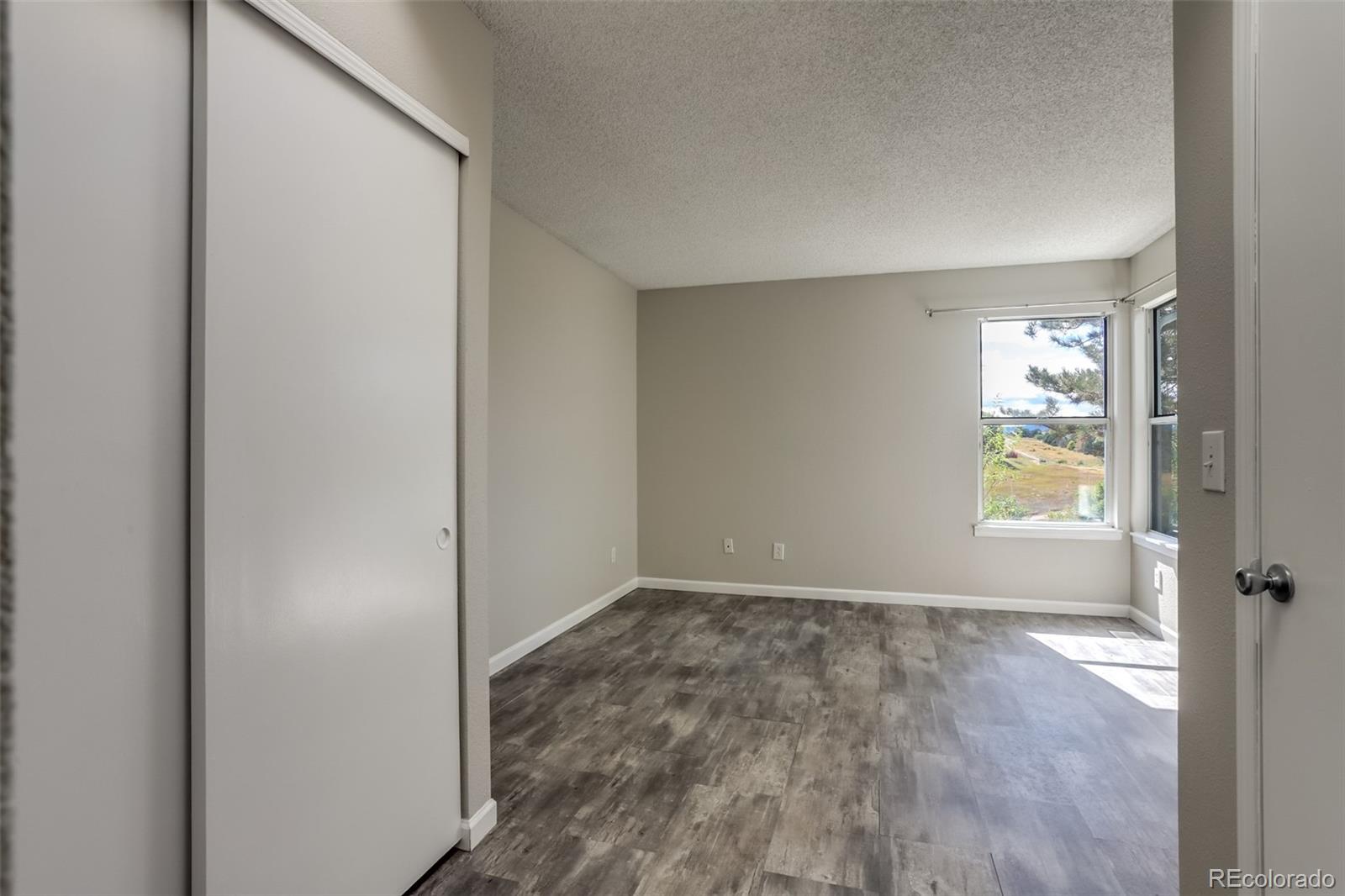 514 Longfellow Lane Highlands Ranch, CO 80126 - Photo 13 of 43 a view of an empty room and window