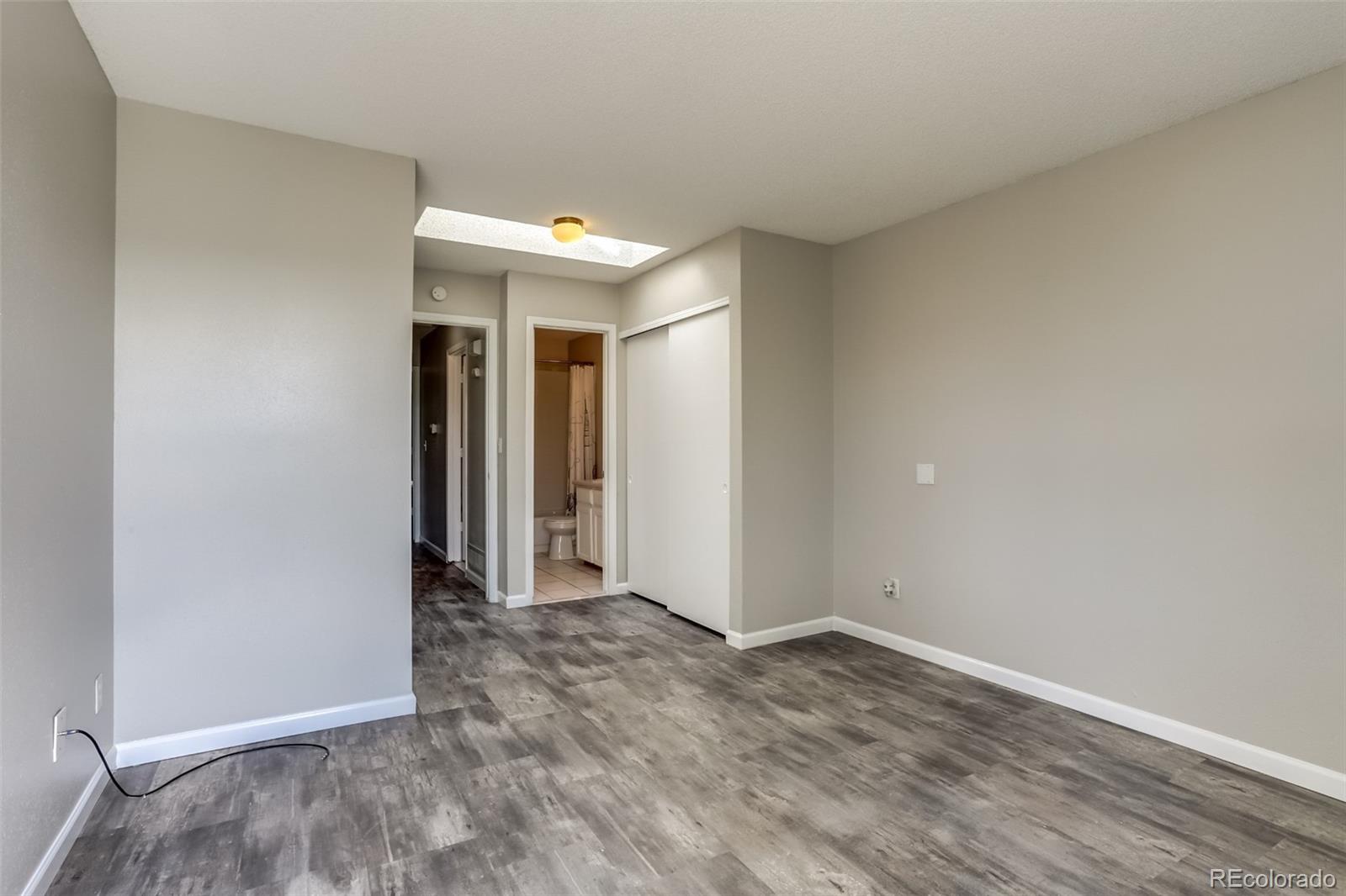 514 Longfellow Lane Highlands Ranch, CO 80126 - Photo 17 of 43 wooden floor in an empty room