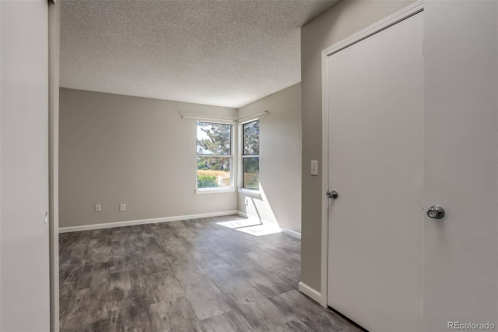 514 Longfellow Lane Highlands Ranch, CO 80126 - Photo 20 of 43 a view of an empty room with a window