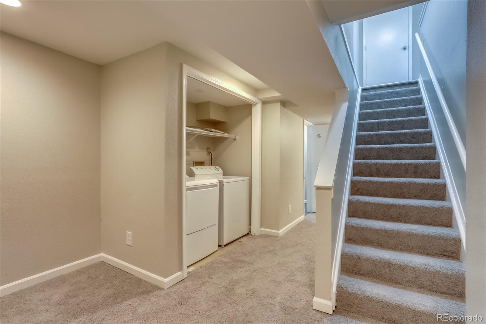 514 Longfellow Lane Highlands Ranch, CO 80126 - Photo 22 of 43 a view of an entryway with staircase