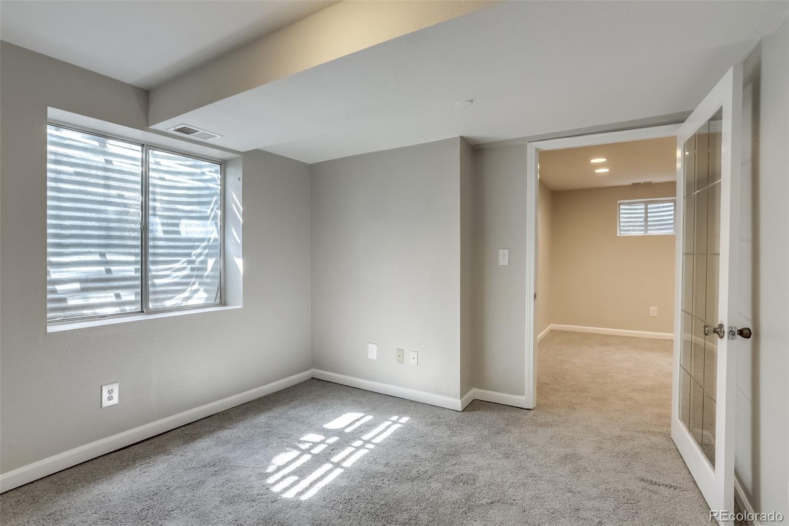 514 Longfellow Lane Highlands Ranch, CO 80126 - Photo 25 of 43 a view of an empty room with a window