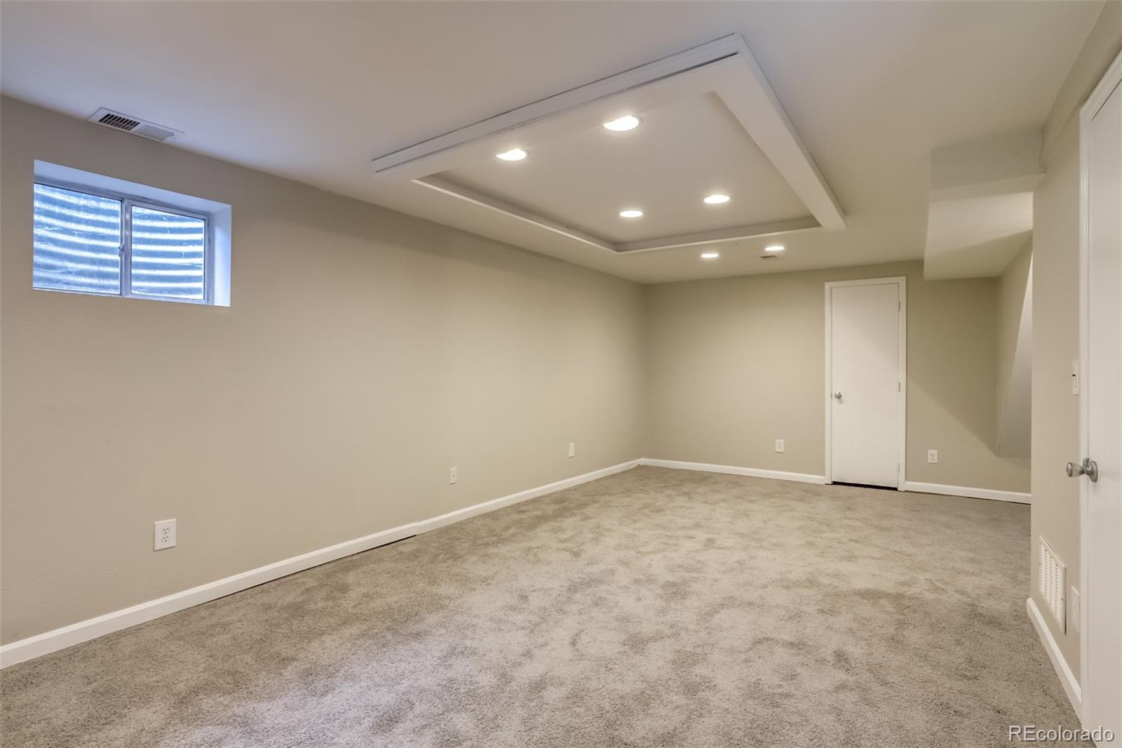 514 Longfellow Lane Highlands Ranch, CO 80126 - Photo 29 of 43 an empty room with windows