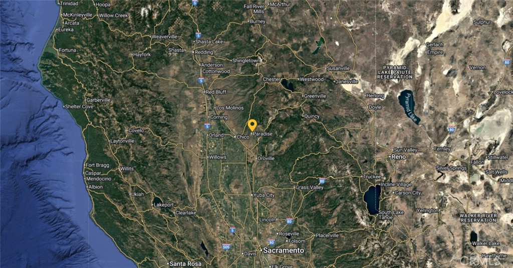 1074 Wagstaff Road Paradise, CA 95969 - Photo 8 of 8 a backyard of a house with lots of green space