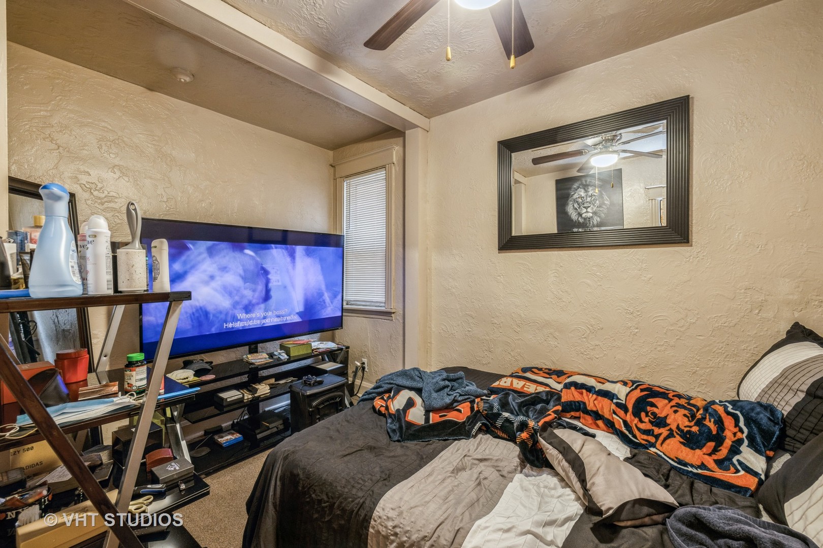 4033 West Cermak Road Chicago, IL 60623 - Photo 7 of 17 a bedroom with bed and a painting on the wall