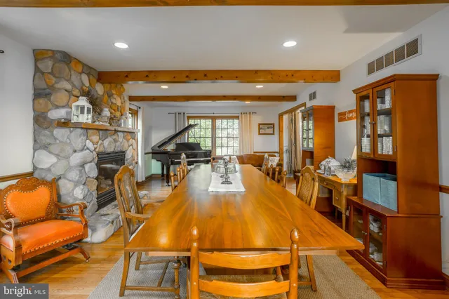 a bed room with a bed and a chair