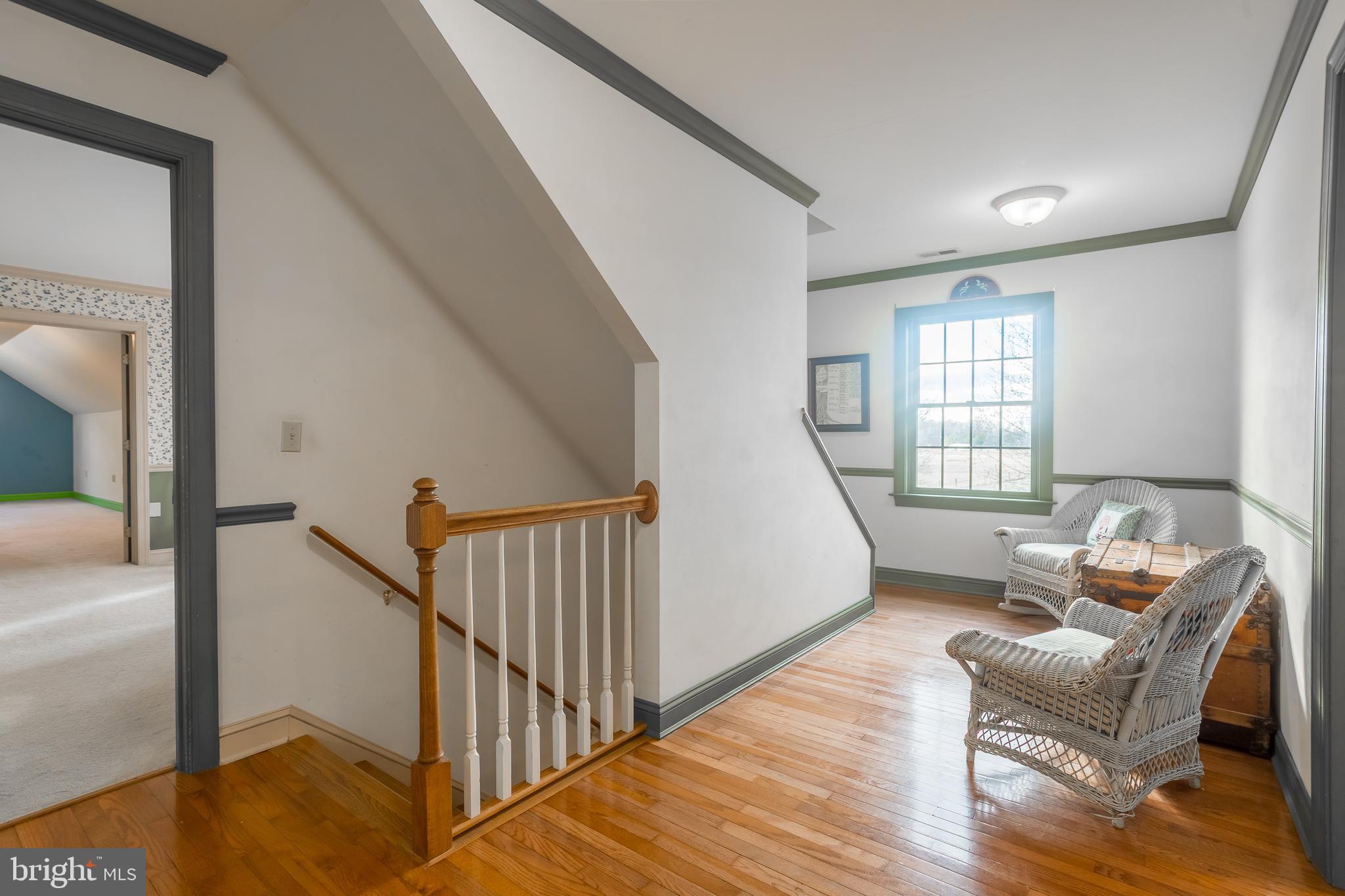 7904 Clark Road Denton, MD 21629 - Photo 29 of 71 a living room with furniture and a wooden floor