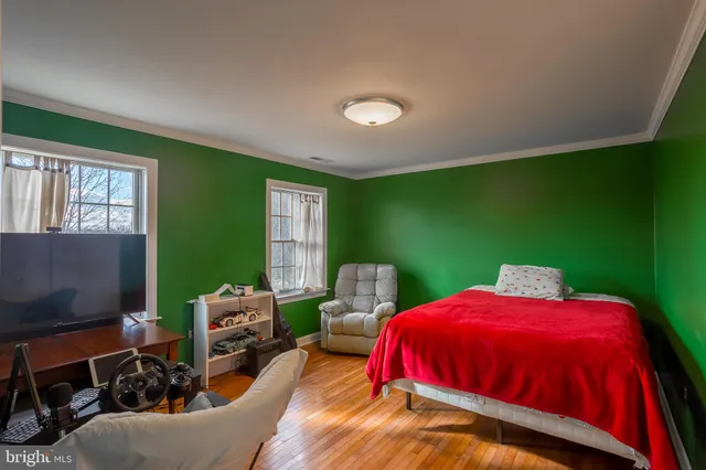 a bed room with a bed and furniture