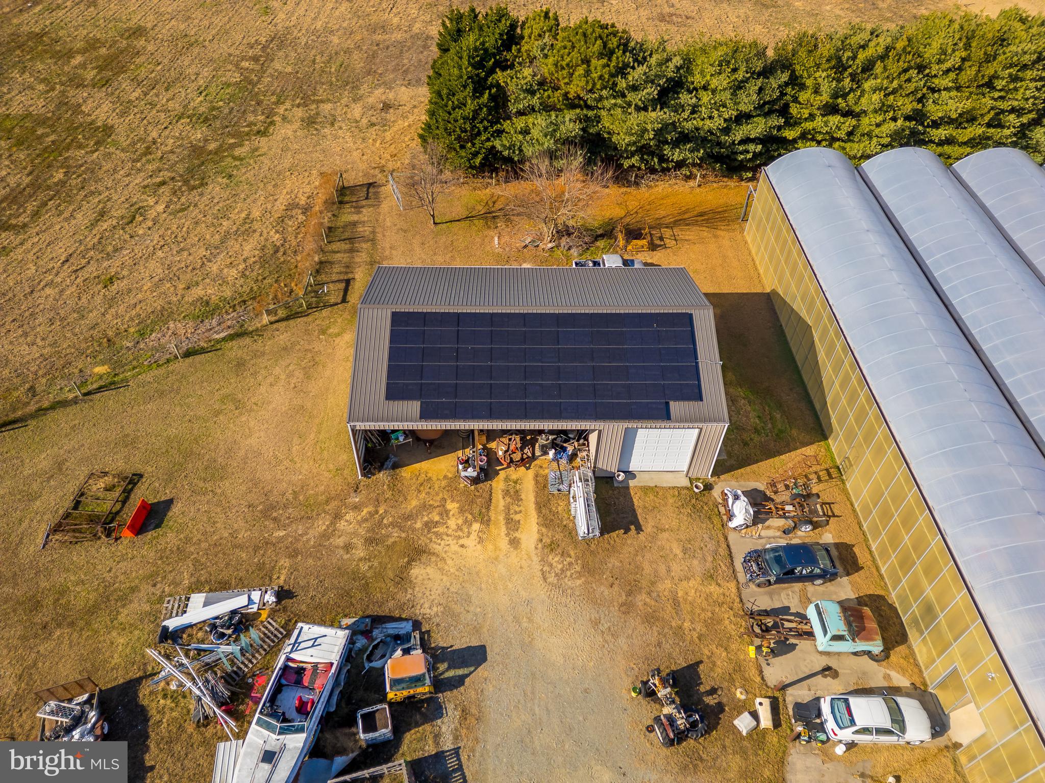 7904 Clark Road Denton, MD 21629 - Photo 51 of 71 a view of roof with sitting area