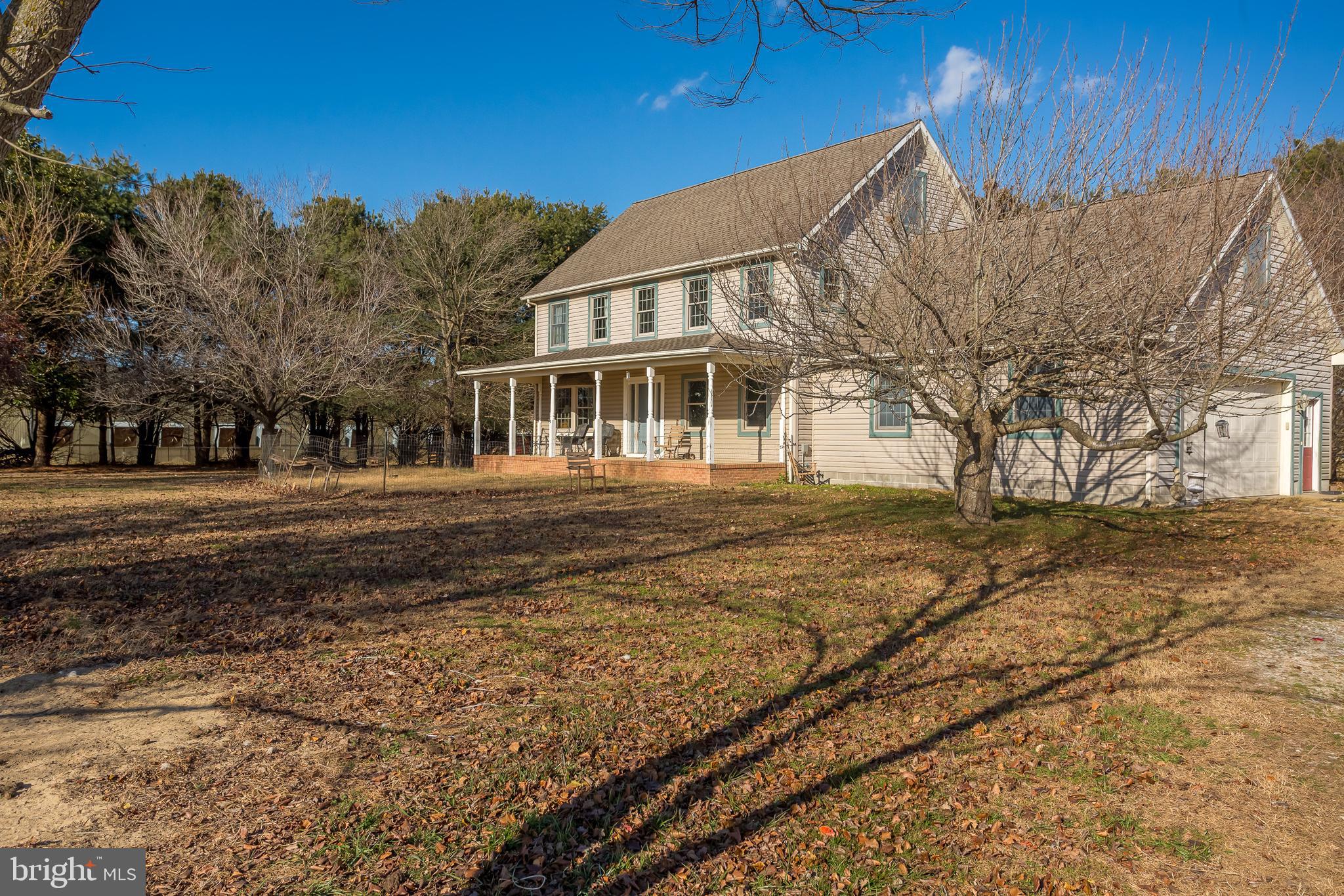 7904 Clark Road Denton, MD 21629 - Photo 6 of 71 a view of a house with a yard