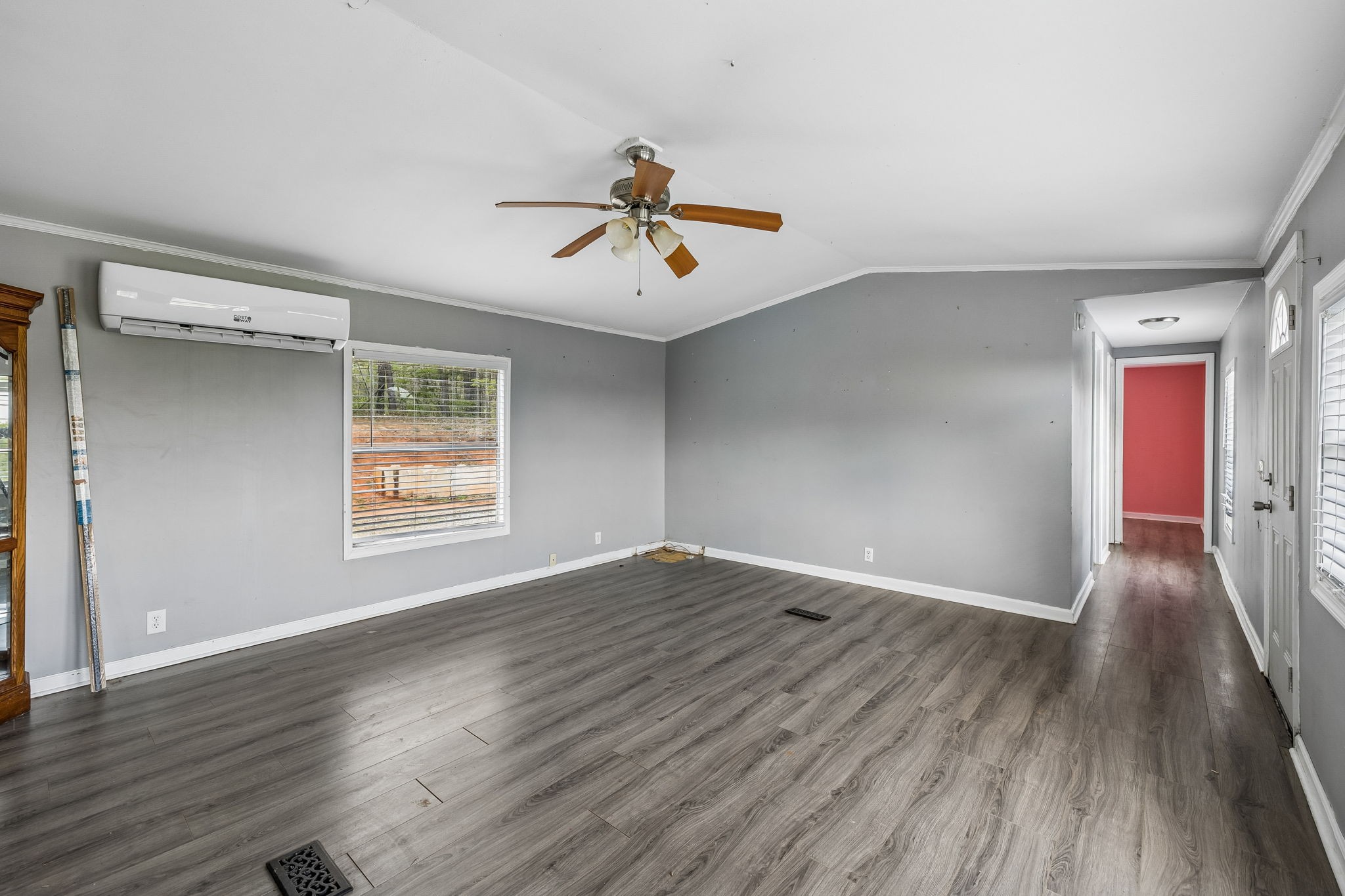 1033 Pollard Road Walling, TN 38587 - Photo 11 of 39 wooden floor in an empty room with a window