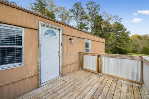 a view of a house with a roof deck