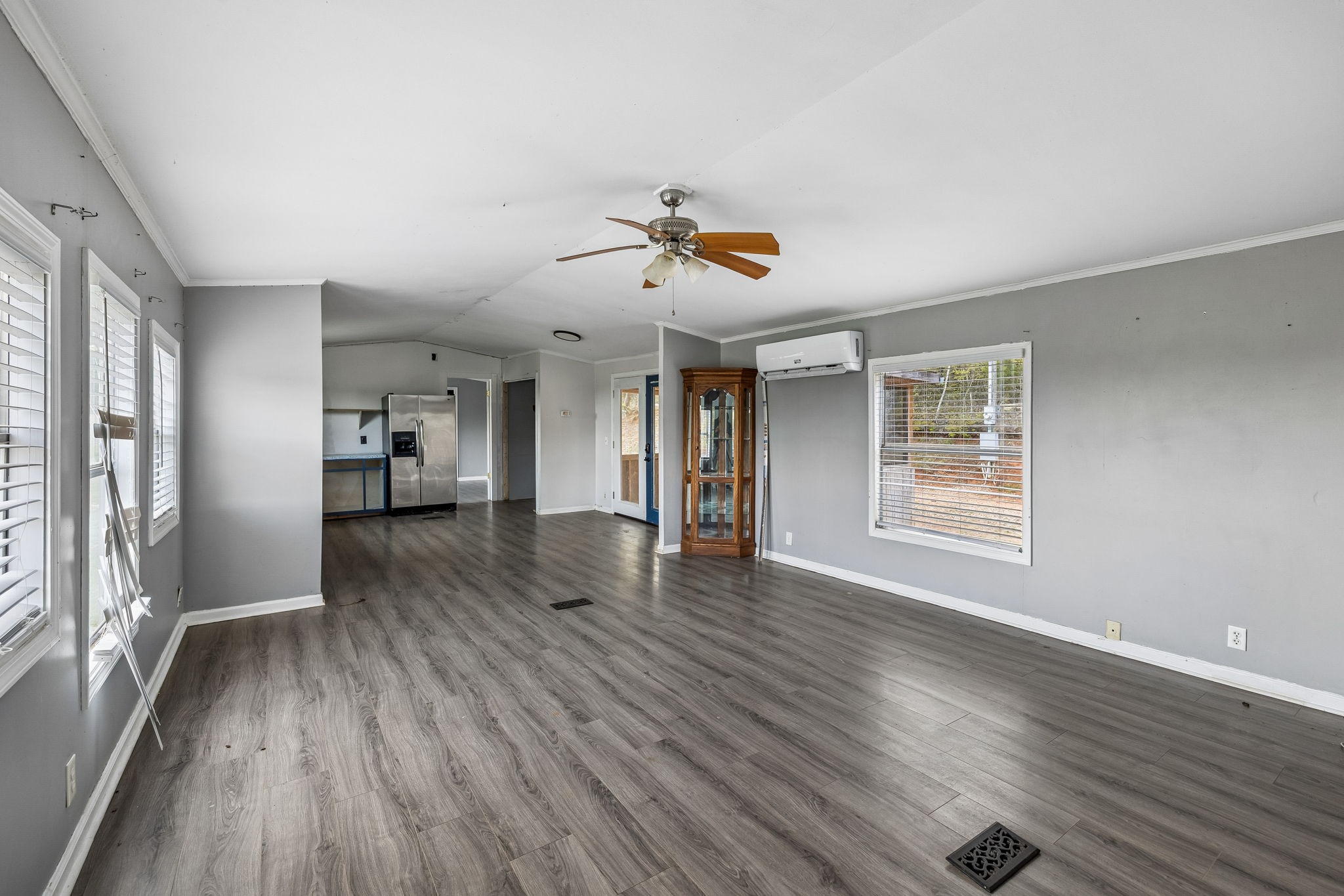 1033 Pollard Road Walling, TN 38587 - Photo 8 of 39 wooden floor in an empty room with a window
