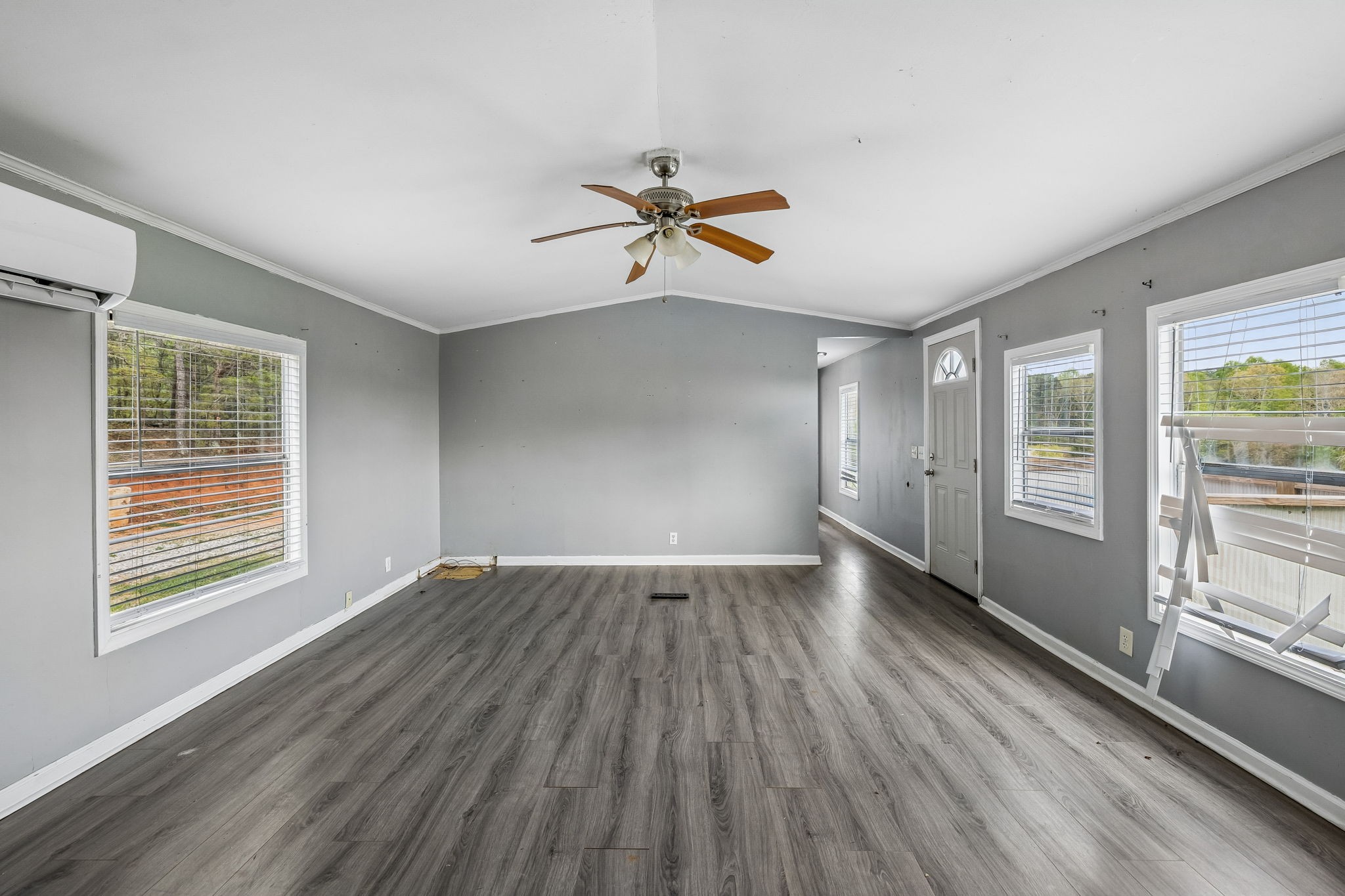 1033 Pollard Road Walling, TN 38587 - Photo 10 of 39 wooden floor in an empty room with a window