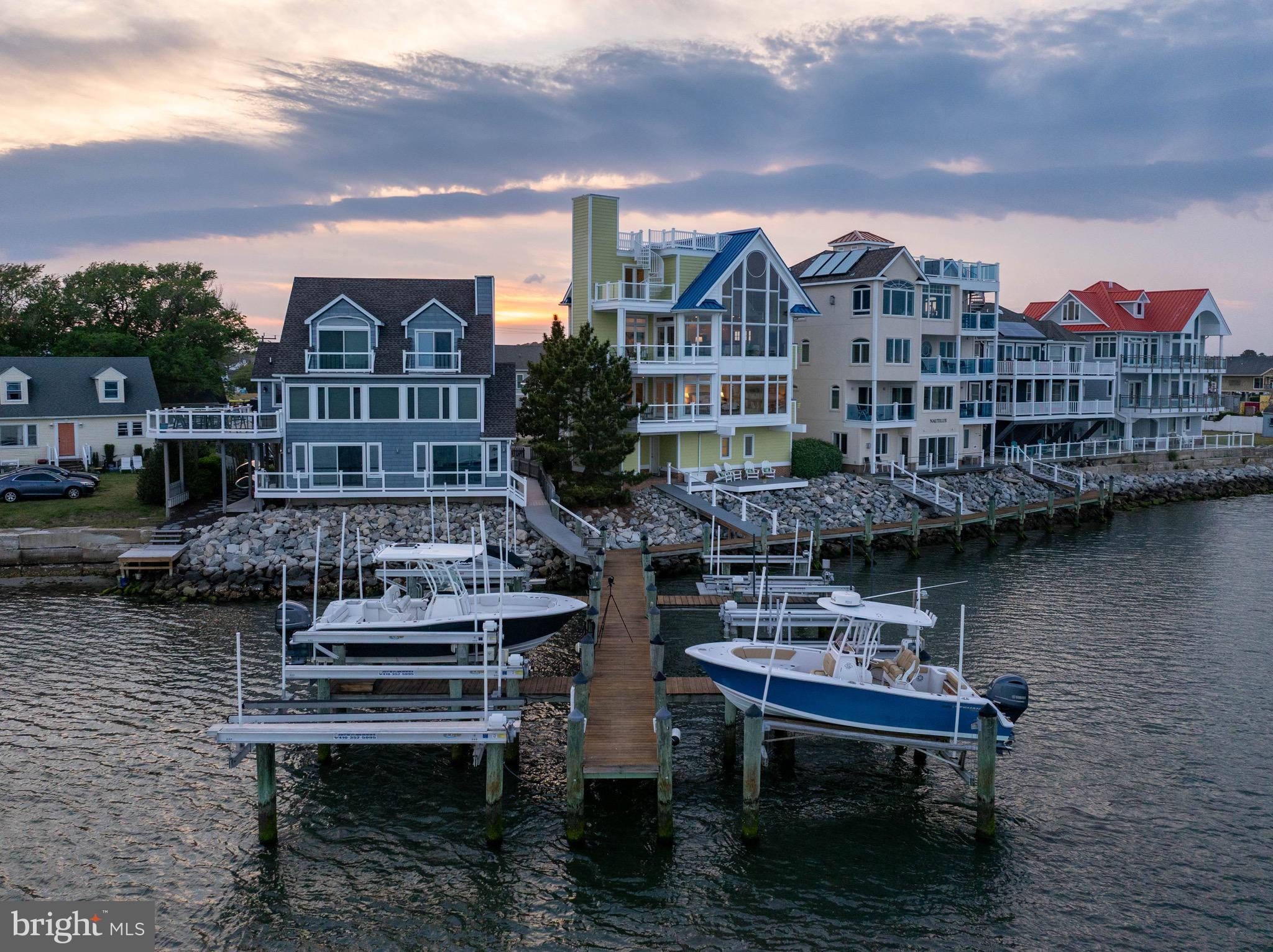 12959 Harbor Road Ocean City, MD 21842 - Photo 61 of 85 a view of a lake with a terrace