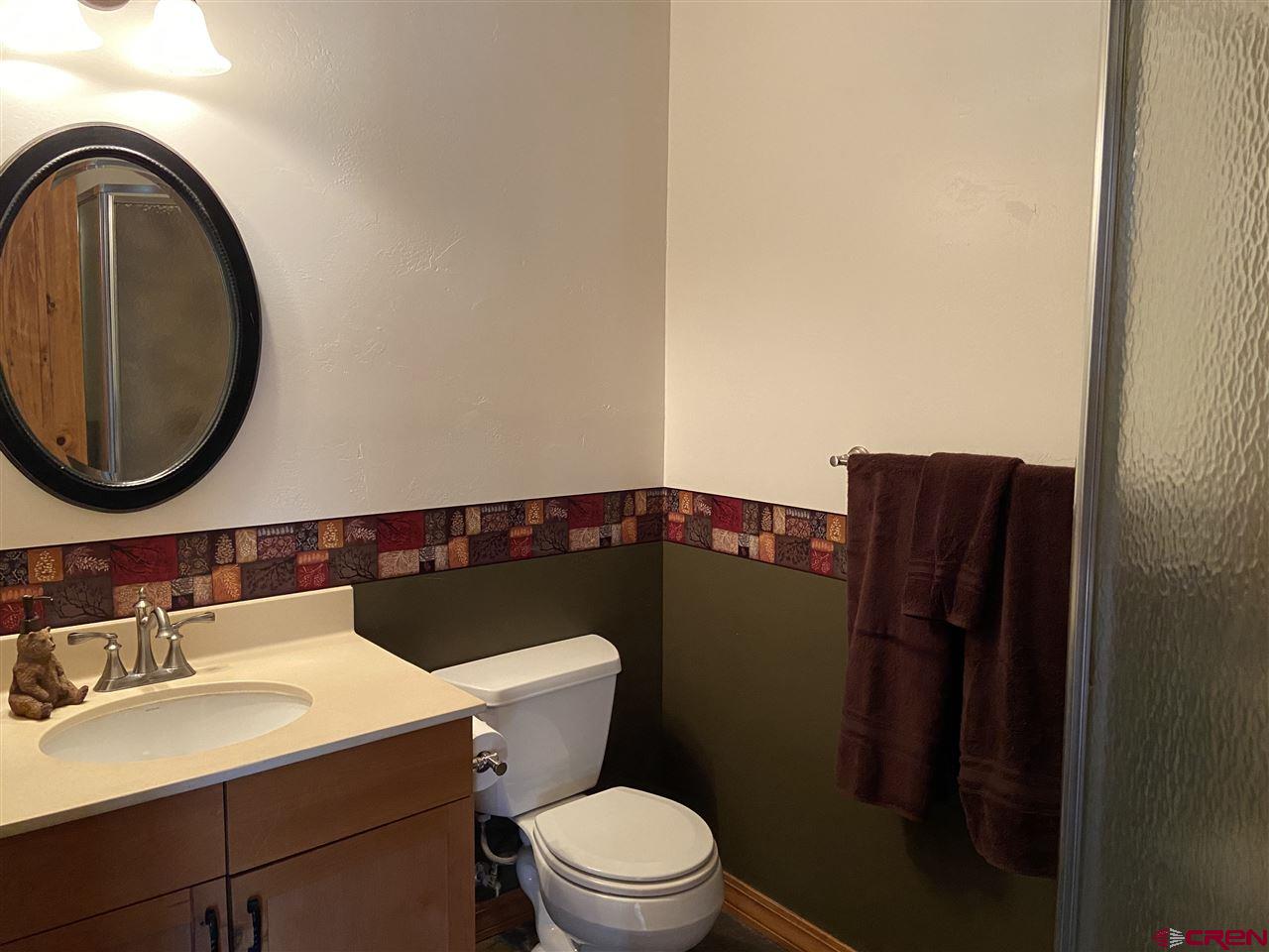 18181 Hanson Road Cedaredge, CO 81413 - Photo 19 of 23 3/4 bath on main level