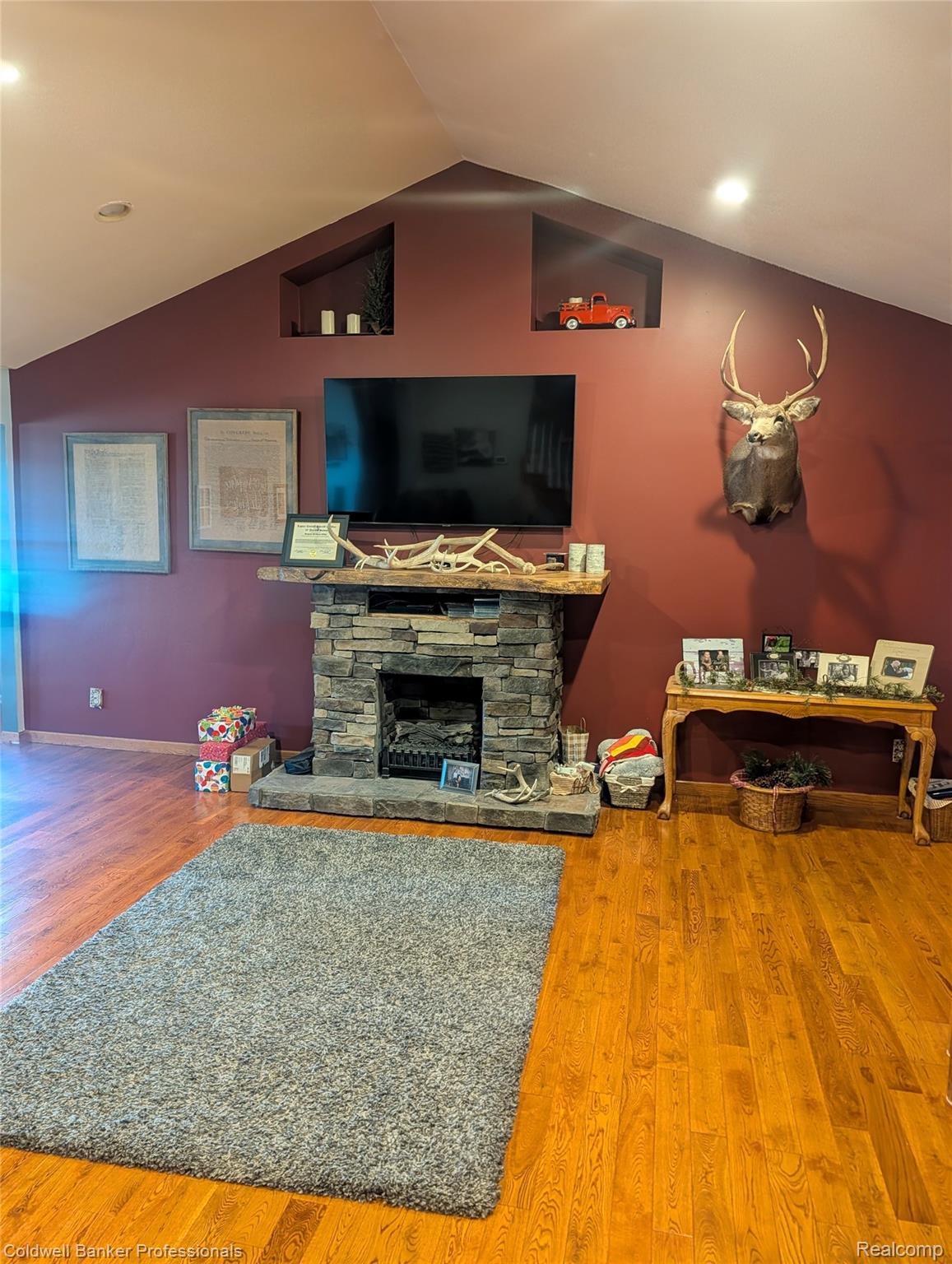 3210 South Kingston Road Kingston, MI 48741 - Photo 24 of 64 Living room with wood finished floors, a fireplace, and recessed lighting