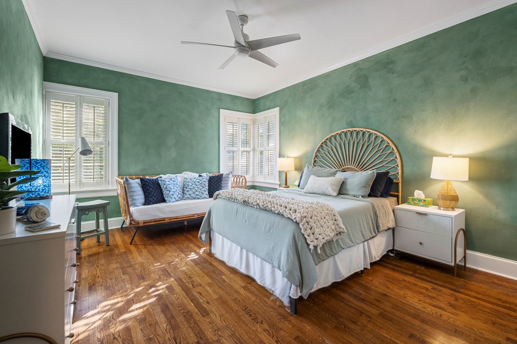 2134 13th Street Columbus, GA 31906 - Photo 17 of 27 a bedroom with a bed couch and window
