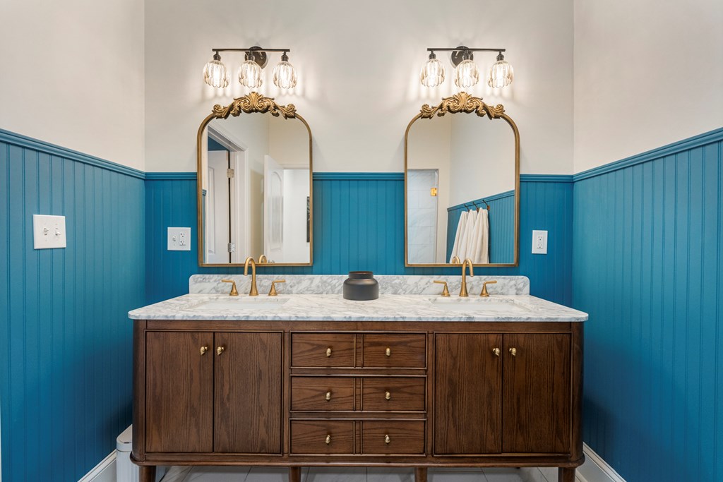 2134 13th Street Columbus, GA 31906 - Photo 22 of 27 a bathroom with a sink and a mirror