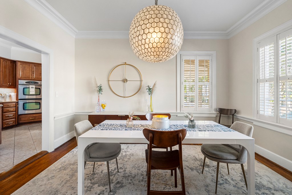 2134 13th Street Columbus, GA 31906 - Photo 7 of 27 a dining room with furniture and a large window