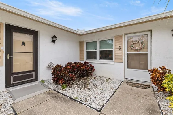 a view of a entryway door front of house