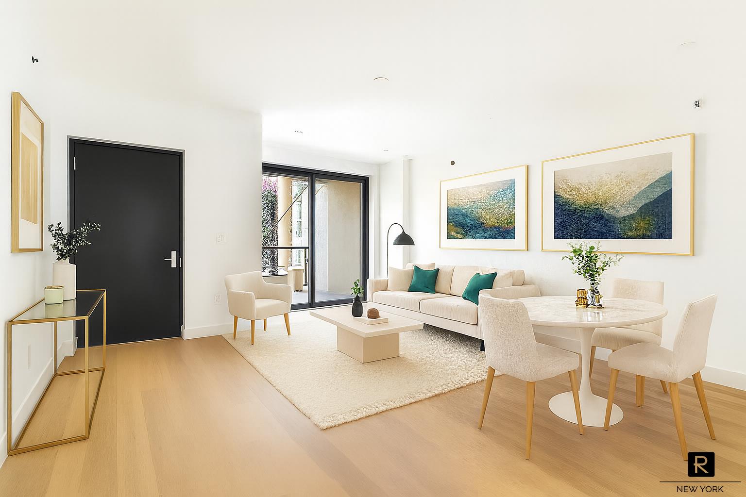 340 Metropolitan Avenue, Unit 5B Brooklyn, NY 11211 - Photo 5 of 12 a living room with furniture and a flat screen tv