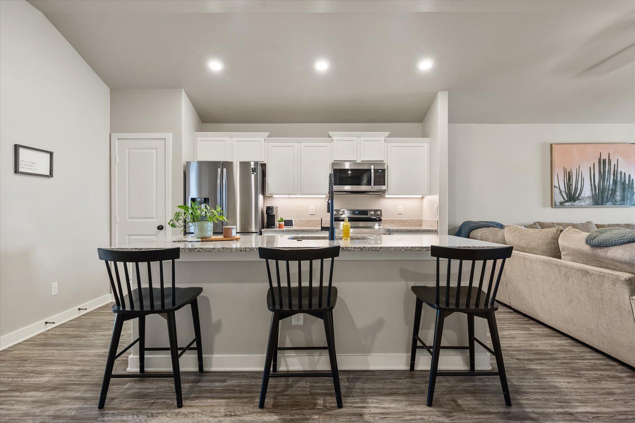 1902 137th Street Lubbock, TX 79423 - Photo 14 of 27 a view of a dining room with furniture