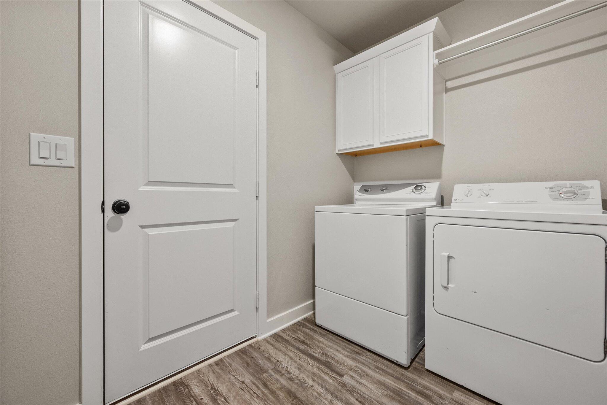 1902 137th Street Lubbock, TX 79423 - Photo 27 of 27 a utility room with dryer and washer