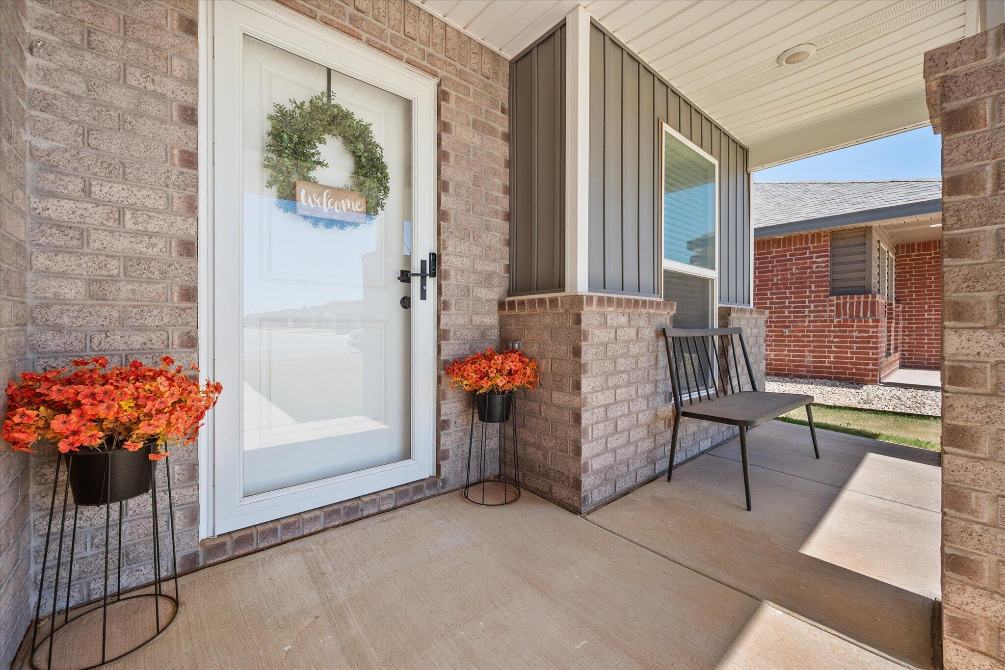 1902 137th Street Lubbock, TX 79423 - Photo 5 of 27 a view of entryway with a couch