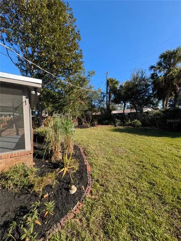 a view of outdoor space and yard