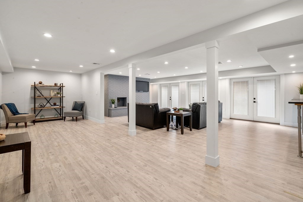 1106 Edgell Road Framingham, MA 01701 - Photo 22 of 34 a large room with gym equipment and a large window
