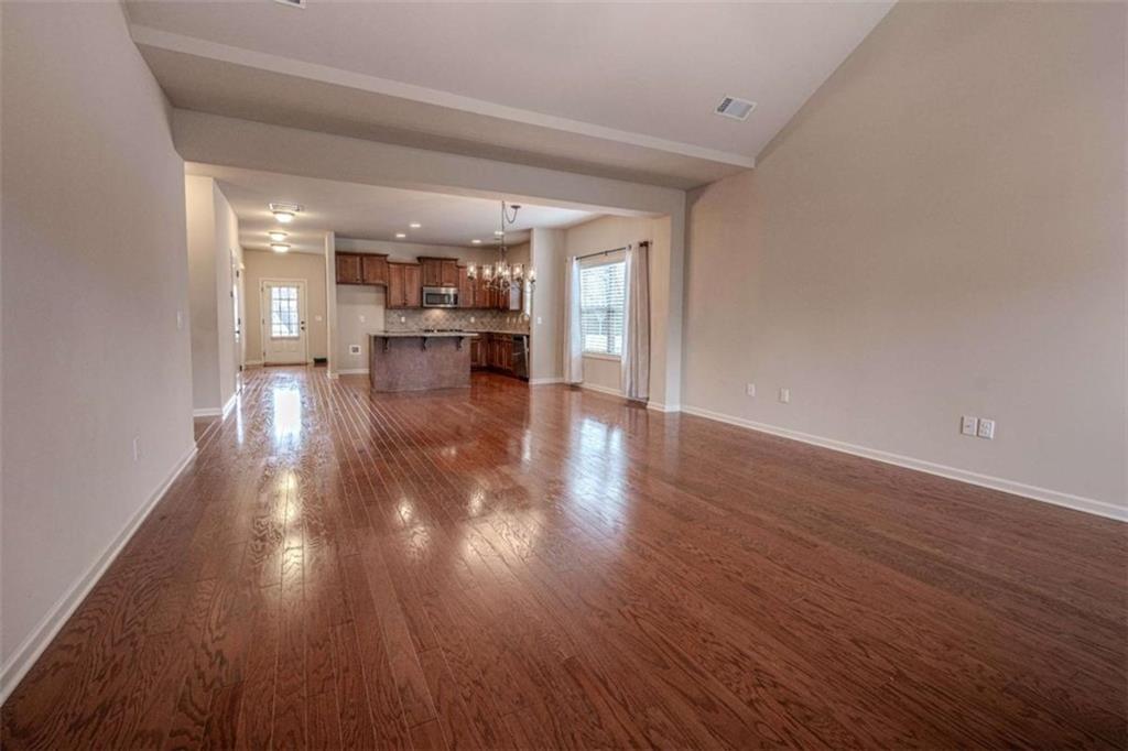 205 Heritage Stroll Athens, GA 30606 - Photo 12 of 30 a view of empty room with wooden floor