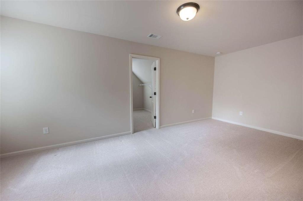 205 Heritage Stroll Athens, GA 30606 - Photo 27 of 30 a view of an empty room