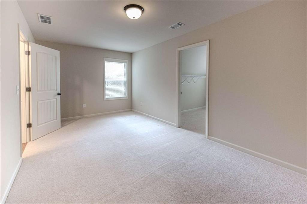 205 Heritage Stroll Athens, GA 30606 - Photo 28 of 30 a view of empty room with window