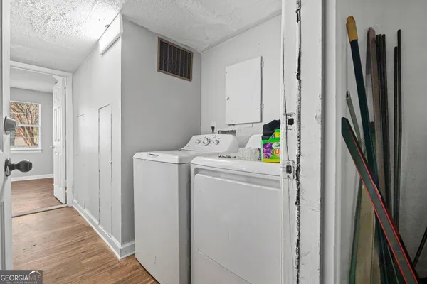 a utility room with dryer and washer
