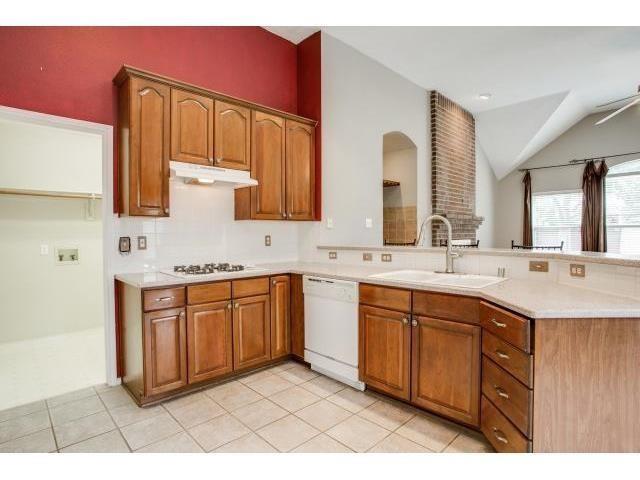 2026 Fox Glen Drive Allen, TX 75013 - Photo 10 of 17 a spacious bathroom with a sink double vanity granite and a mirror