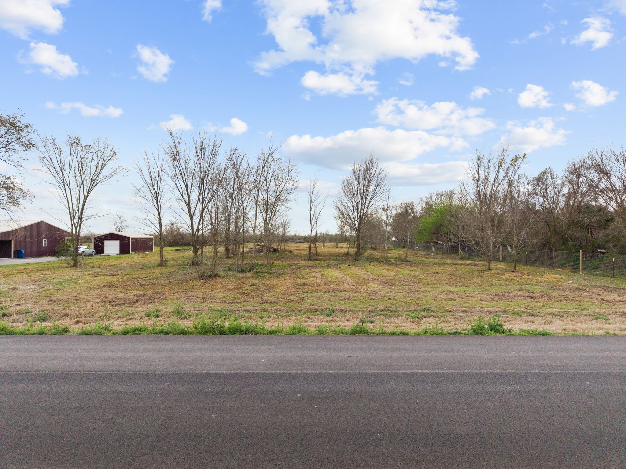 17 County Road 533 Angleton, TX 77515 - Photo 2 of 6 a view of a yard with a house
