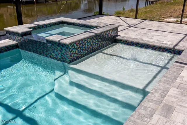 a view of a backyard with chairs